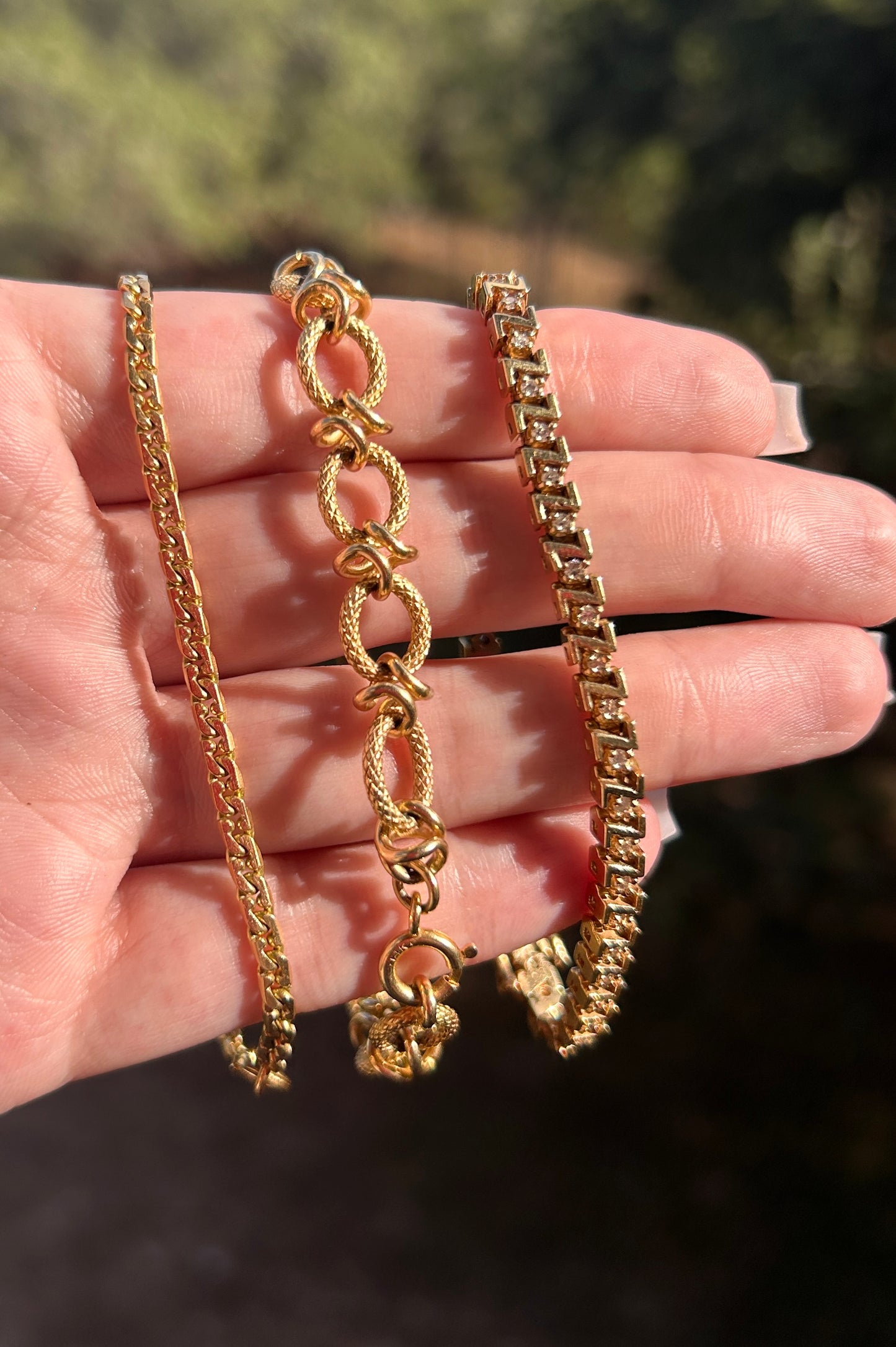 18k tight curb bracelet=7.5"