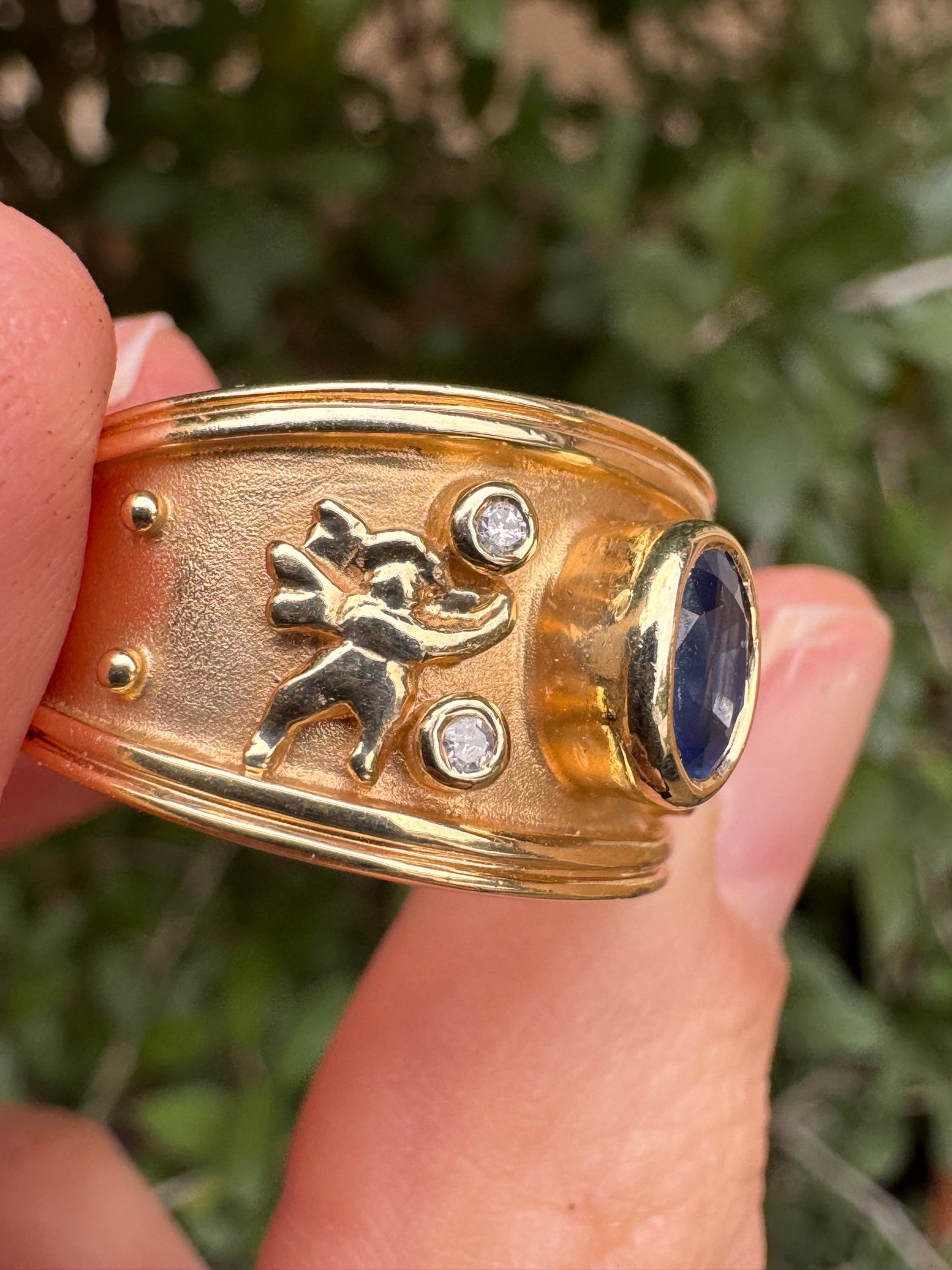 14k sapphire ring with cherubs