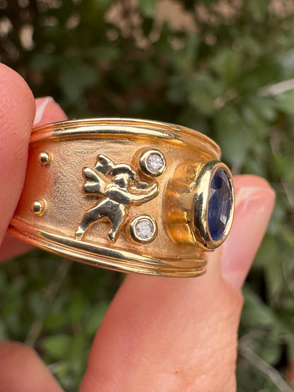 14k sapphire ring with cherubs