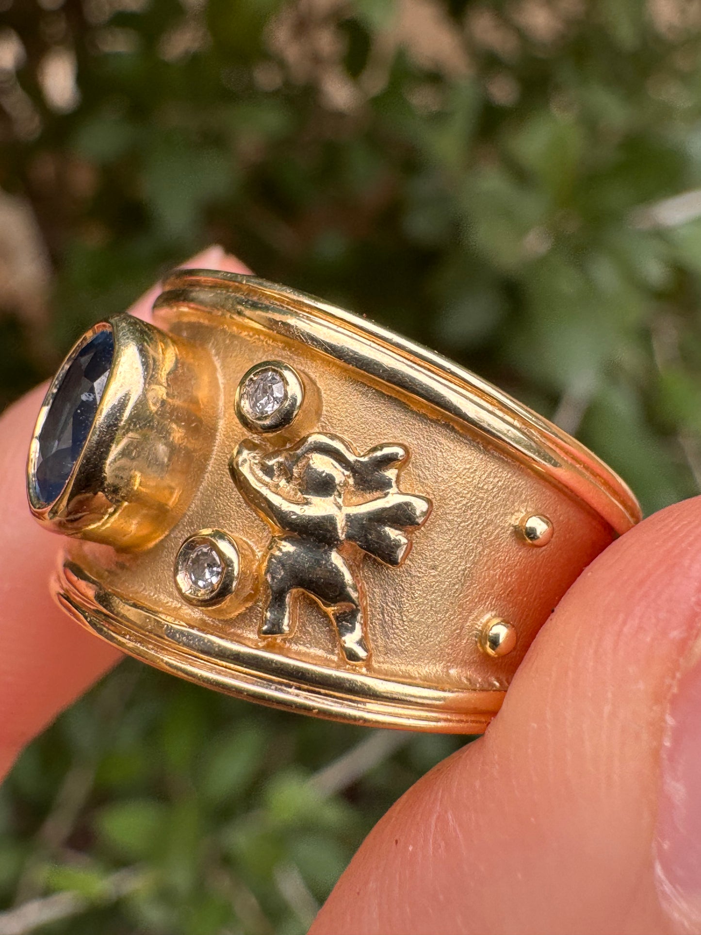 14k sapphire ring with cherubs