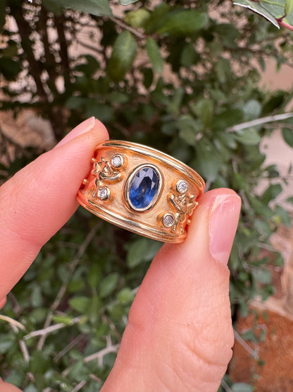 14k sapphire ring with cherubs