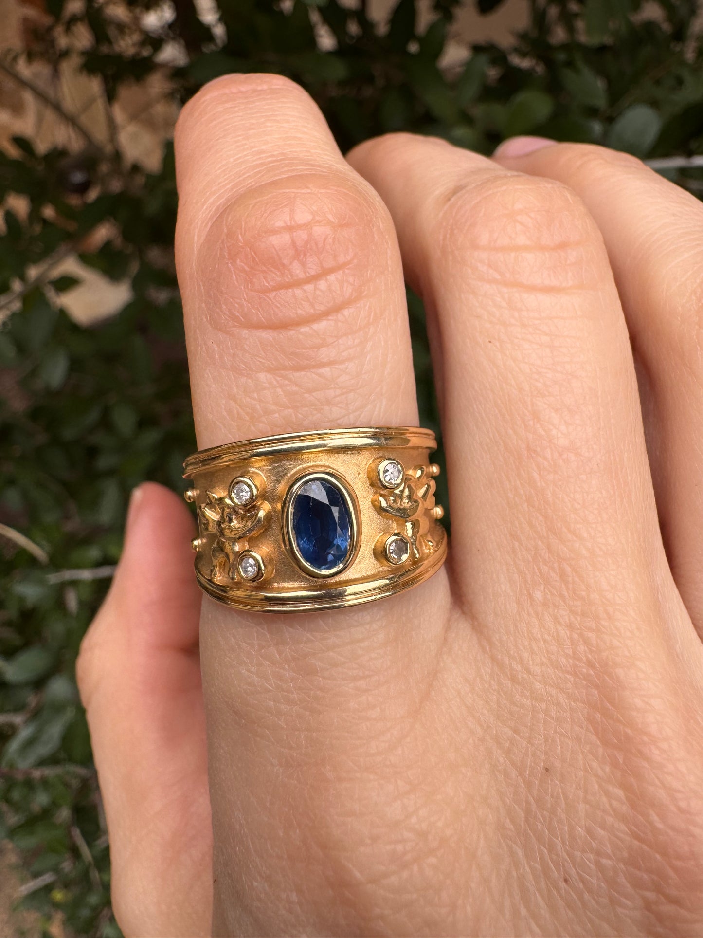 14k sapphire ring with cherubs