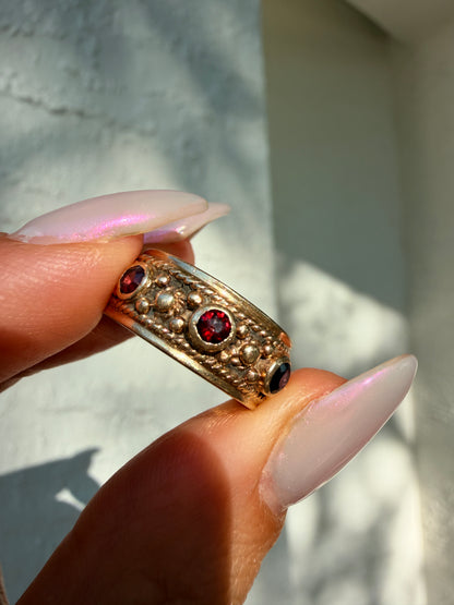 14k Garnet Eternity Band, size 5.25