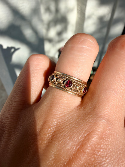 14k Garnet Eternity Band, size 5.25