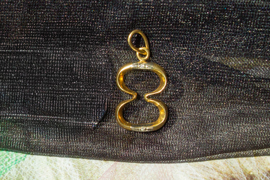 18k infinity charm
