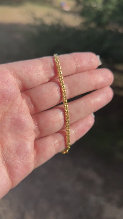18k tight curb bracelet=7.5"