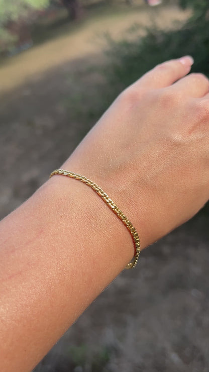 18k tight curb bracelet=7.5"