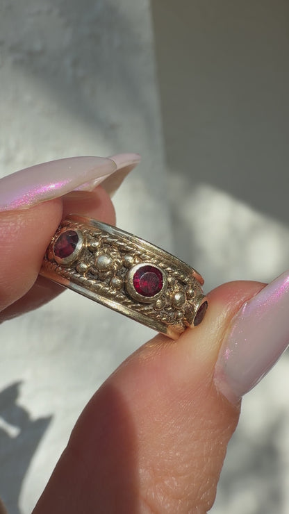 14k Garnet Eternity Band, size 5.25